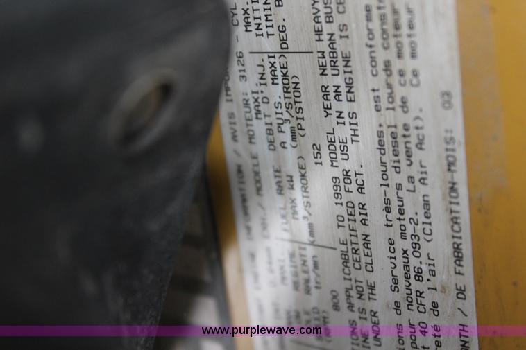 image for item BM9338 2000 Ford F750 flatbed truck with mud mixer