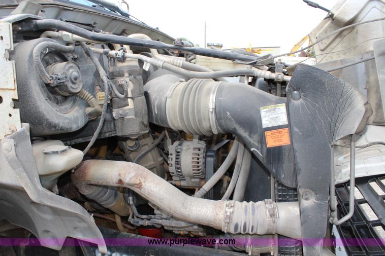 image for item BM9338 2000 Ford F750 flatbed truck with mud mixer