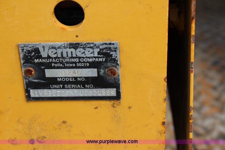 image for item BM9338 2000 Ford F750 flatbed truck with mud mixer