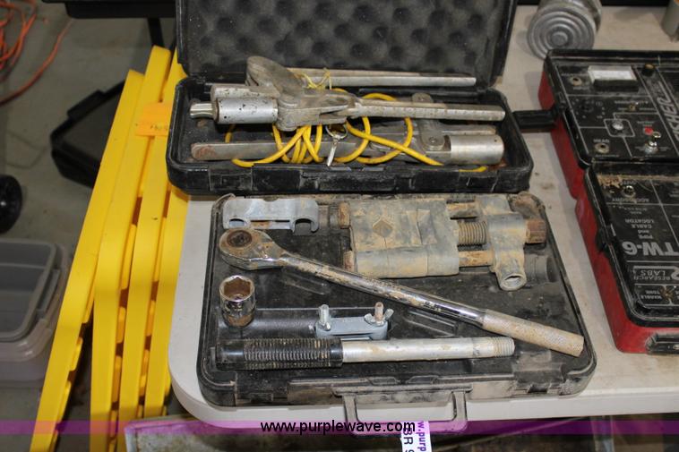 (2) pipe squeeze clamps in Olathe, KS Item BR9943 sold Purple Wave