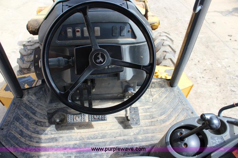 image for item J5851 2006 John Deere 310SG backhoe