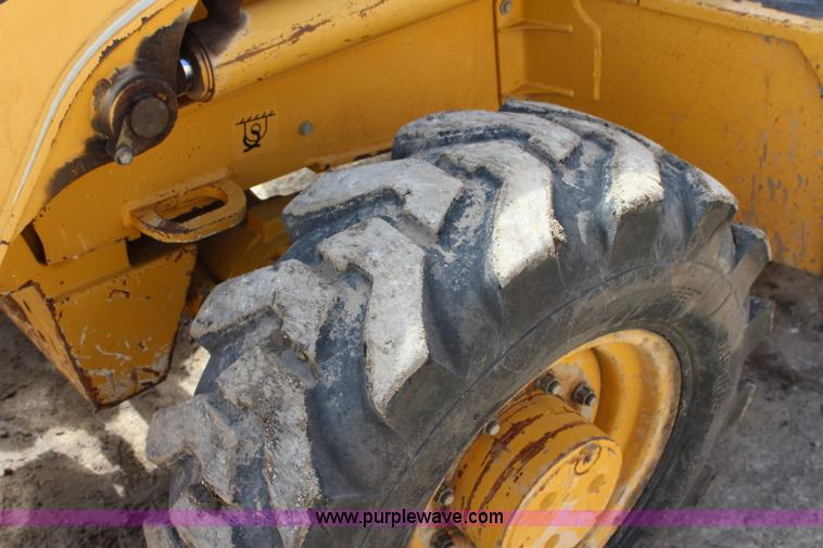 image for item J5851 2006 John Deere 310SG backhoe