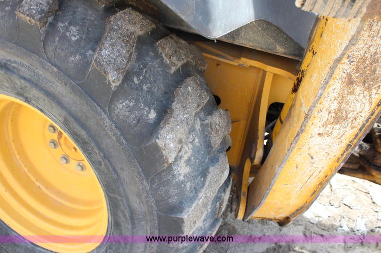 image for item J5851 2006 John Deere 310SG backhoe