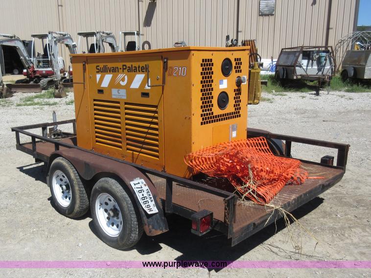 image for item J5924 2006 Emerson utility trailer with air compressor