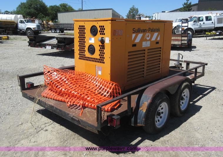 image for item J5924 2006 Emerson utility trailer with air compressor