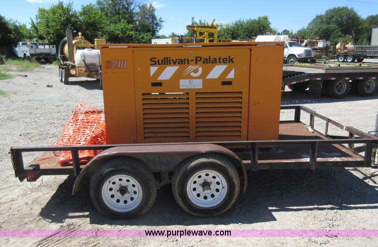 image for item J5924 2006 Emerson utility trailer with air compressor