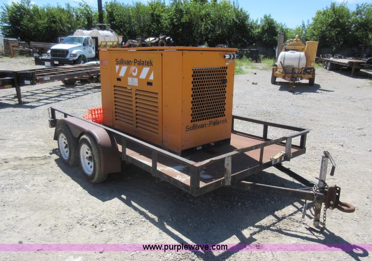 image for item J5924 2006 Emerson utility trailer with air compressor