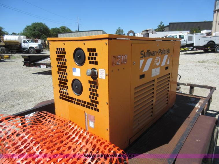 image for item J5924 2006 Emerson utility trailer with air compressor