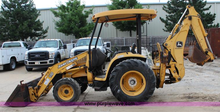 image for item J5936 2002 John Deere 110 backhoe