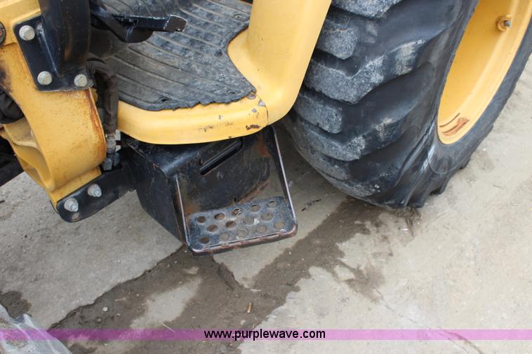 image for item J5936 2002 John Deere 110 backhoe