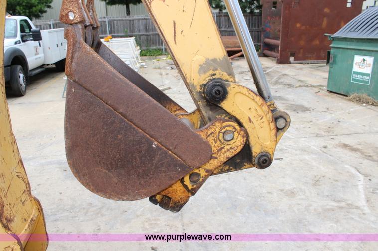 image for item J5936 2002 John Deere 110 backhoe