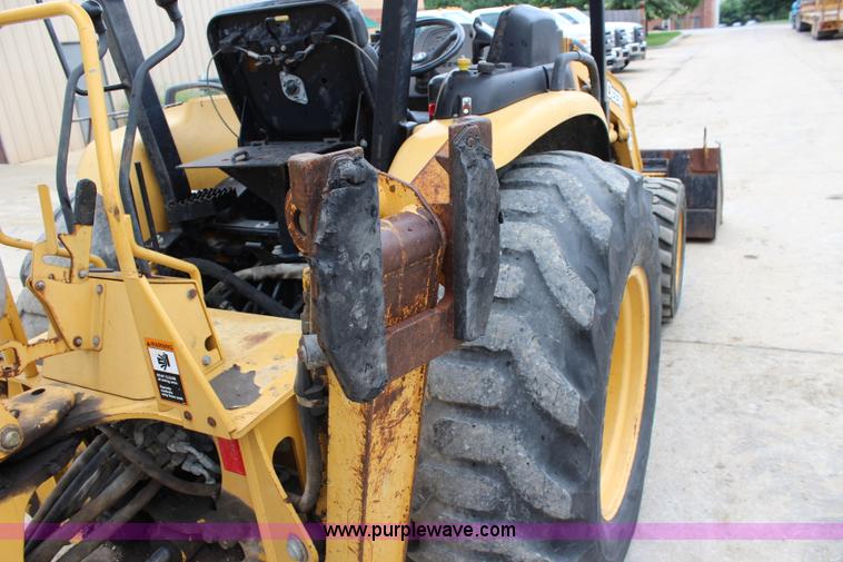image for item J5936 2002 John Deere 110 backhoe