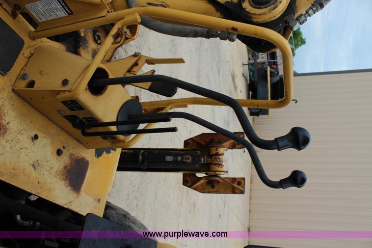 image for item J5936 2002 John Deere 110 backhoe