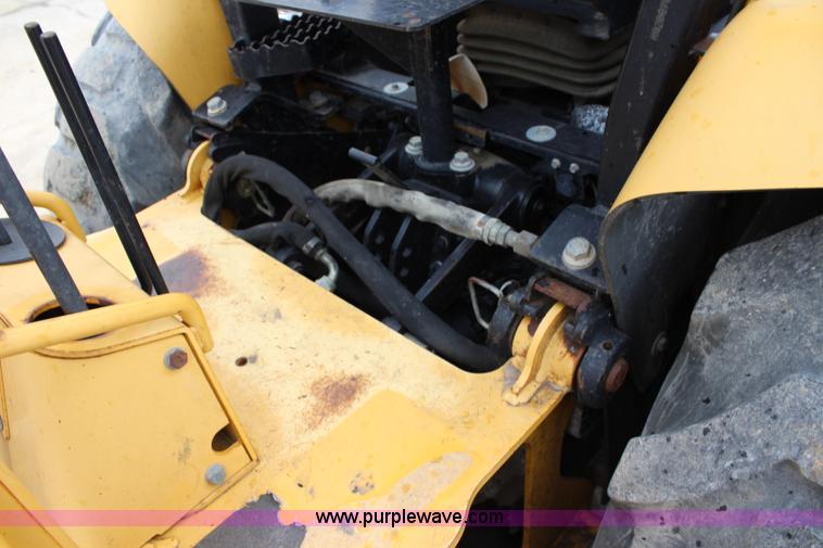 image for item J5936 2002 John Deere 110 backhoe