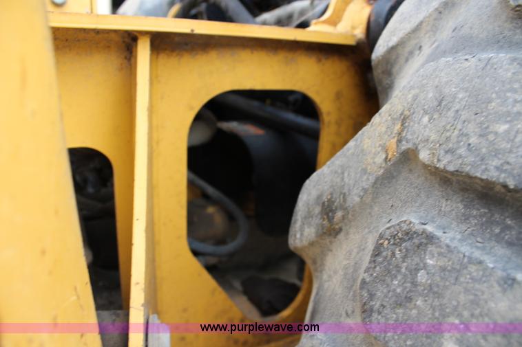 image for item J5936 2002 John Deere 110 backhoe