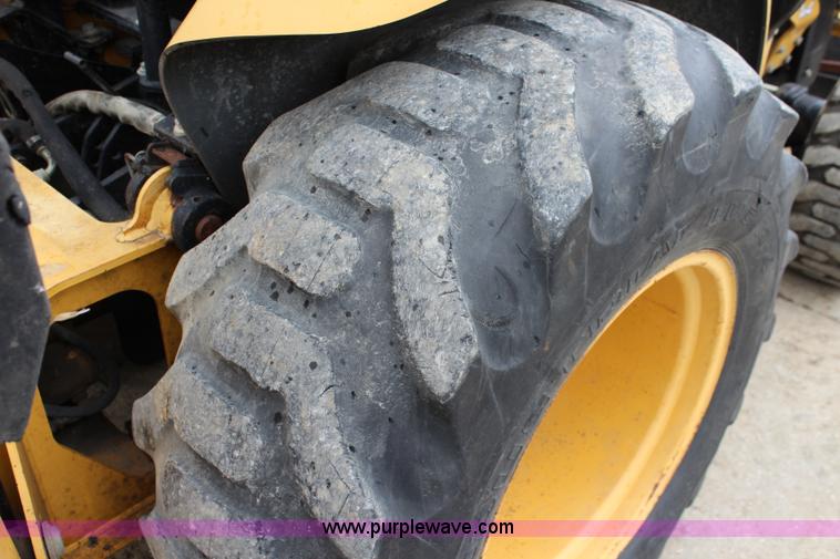 image for item J5936 2002 John Deere 110 backhoe