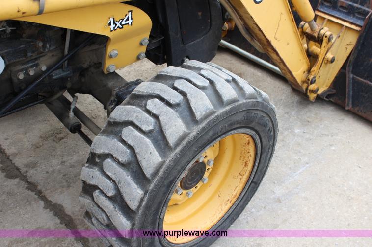 image for item J5936 2002 John Deere 110 backhoe