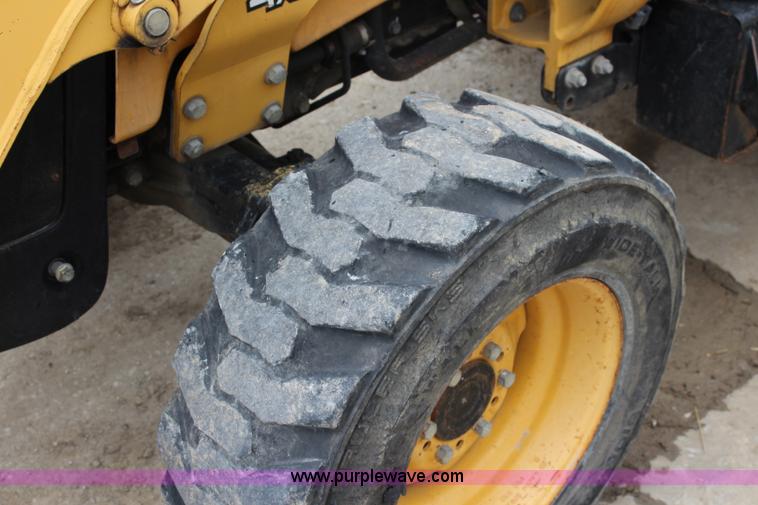 image for item J5936 2002 John Deere 110 backhoe