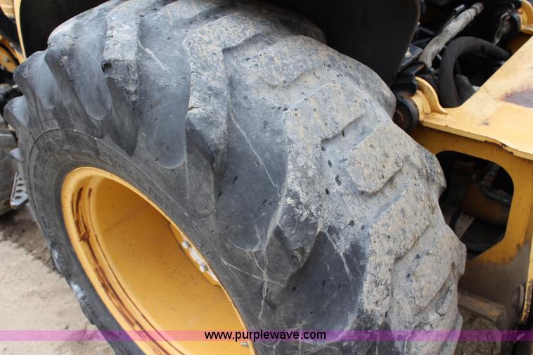 image for item J5936 2002 John Deere 110 backhoe