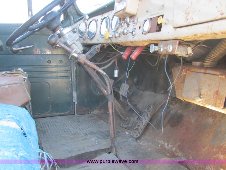 image for item A8833 1958 International 190 truck with live bottom bed
