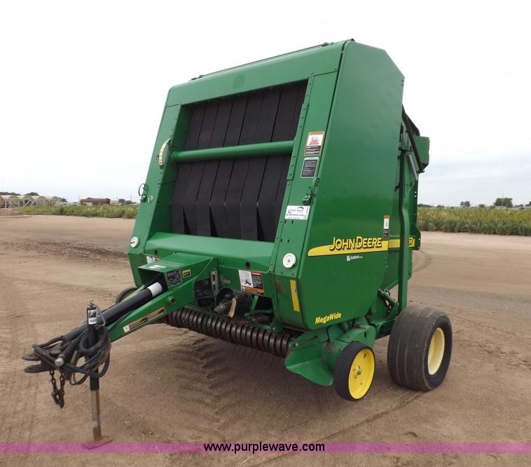 image for item J6869 2003 John Deere 567 Mega Wide round baler