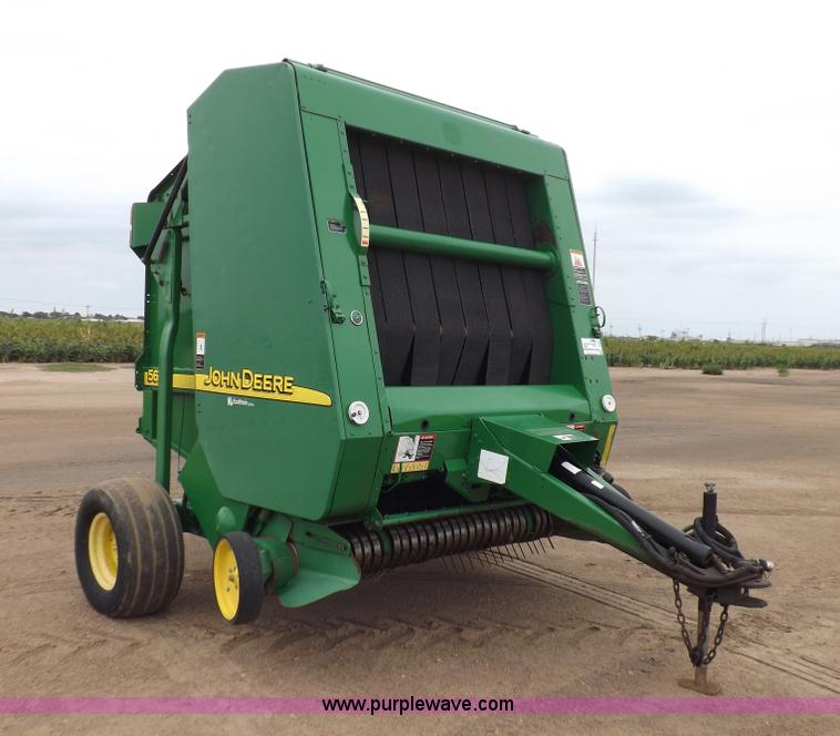 image for item J6869 2003 John Deere 567 Mega Wide round baler