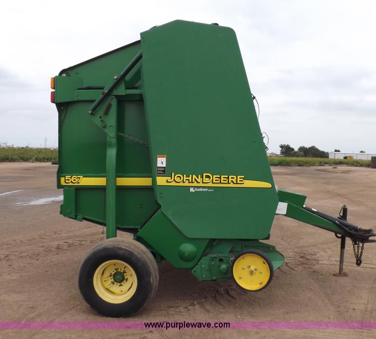 image for item J6869 2003 John Deere 567 Mega Wide round baler