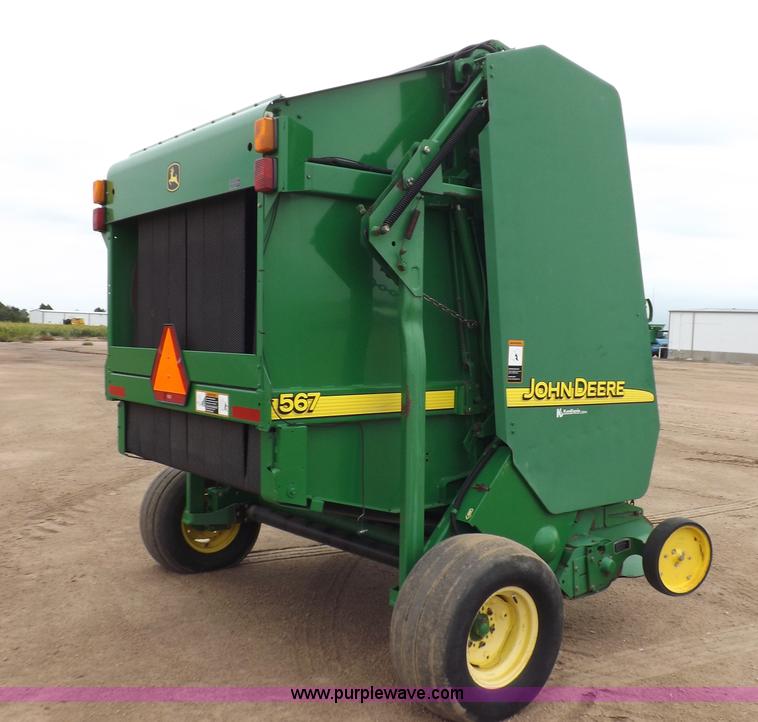 image for item J6869 2003 John Deere 567 Mega Wide round baler