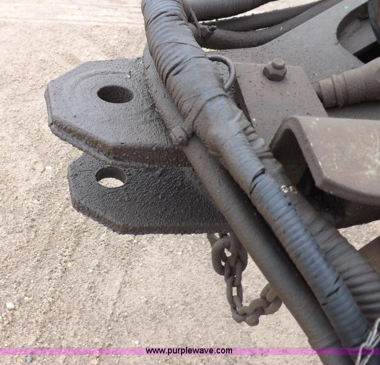 image for item J6869 2003 John Deere 567 Mega Wide round baler