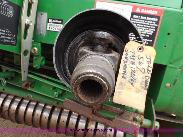 image for item J6869 2003 John Deere 567 Mega Wide round baler
