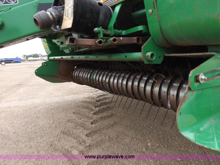 image for item J6869 2003 John Deere 567 Mega Wide round baler