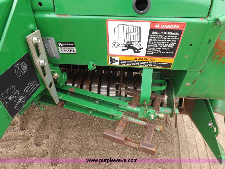 image for item J6869 2003 John Deere 567 Mega Wide round baler