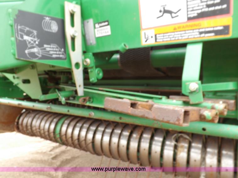 image for item J6869 2003 John Deere 567 Mega Wide round baler