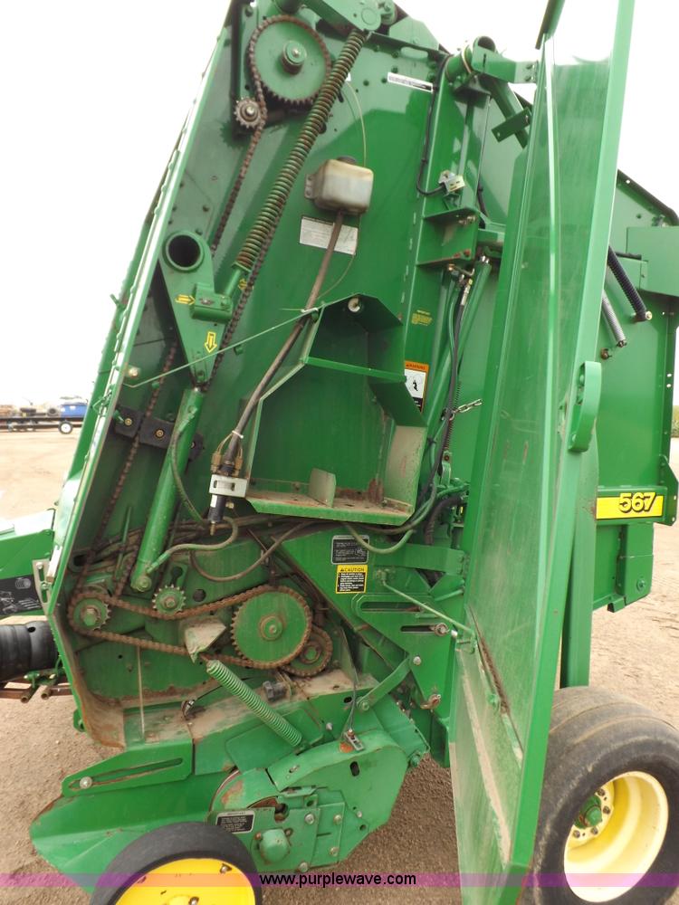 image for item J6869 2003 John Deere 567 Mega Wide round baler
