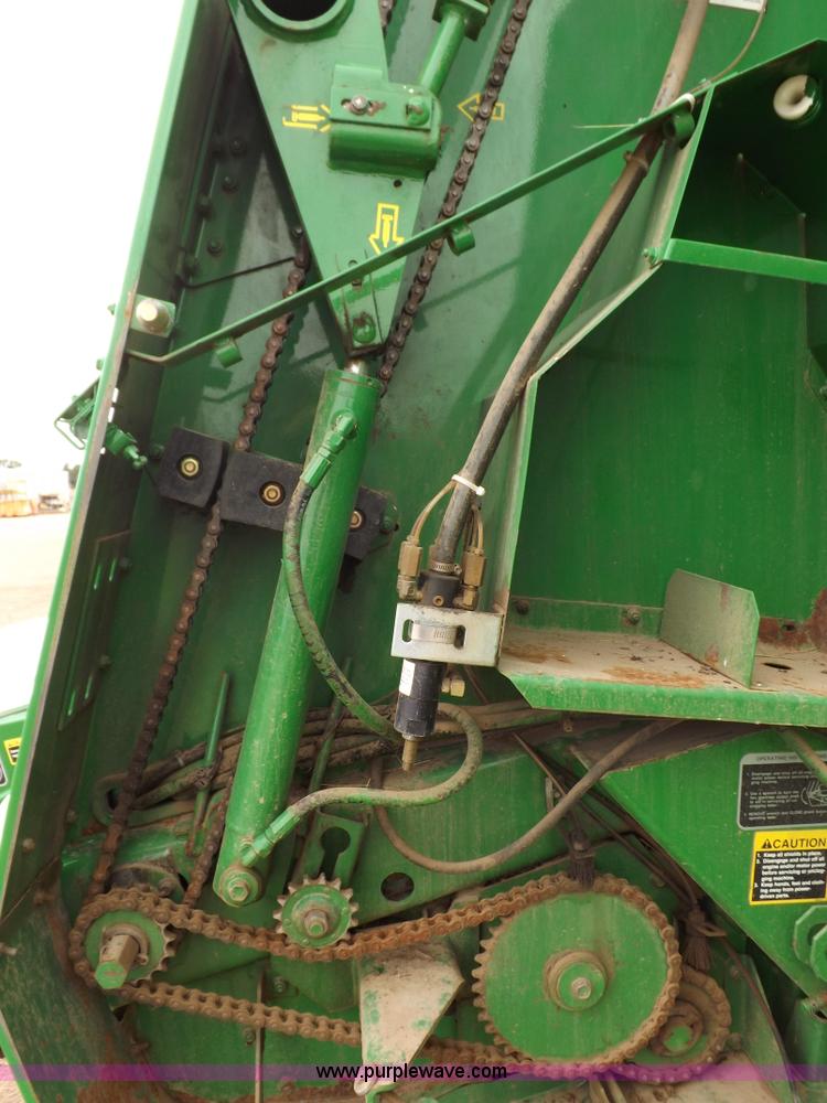 image for item J6869 2003 John Deere 567 Mega Wide round baler