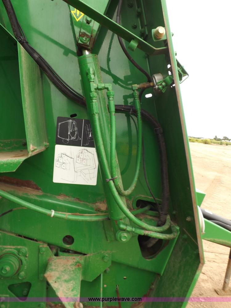 image for item J6869 2003 John Deere 567 Mega Wide round baler
