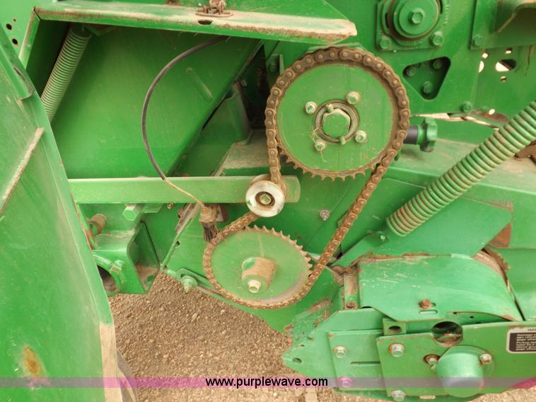 image for item J6869 2003 John Deere 567 Mega Wide round baler