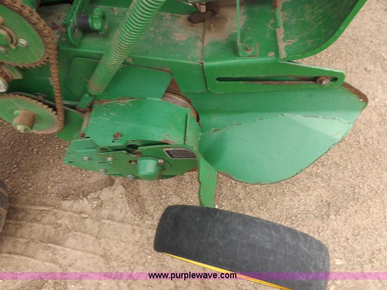 image for item J6869 2003 John Deere 567 Mega Wide round baler