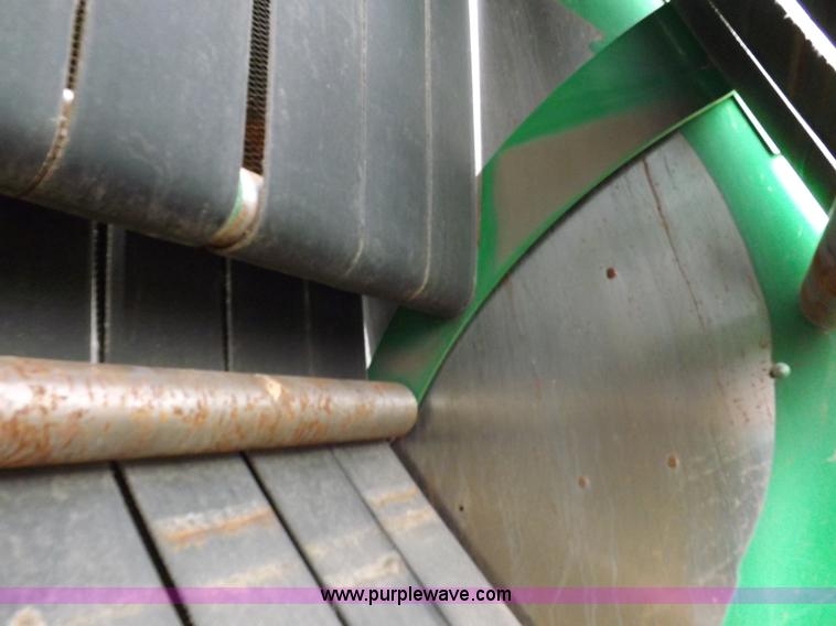 image for item J6869 2003 John Deere 567 Mega Wide round baler