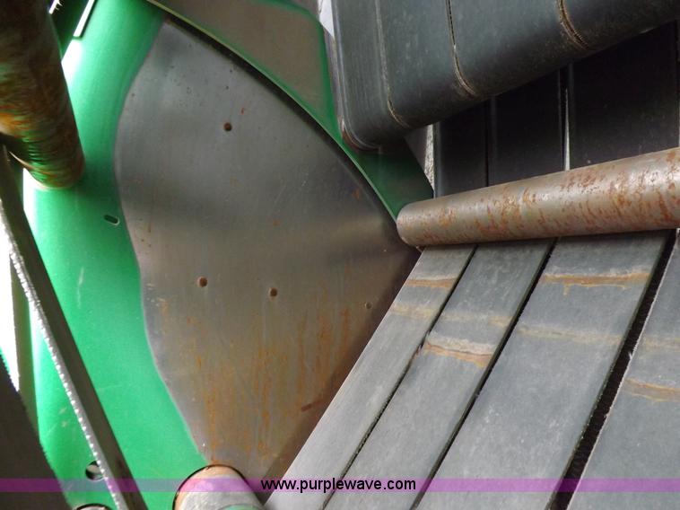 image for item J6869 2003 John Deere 567 Mega Wide round baler