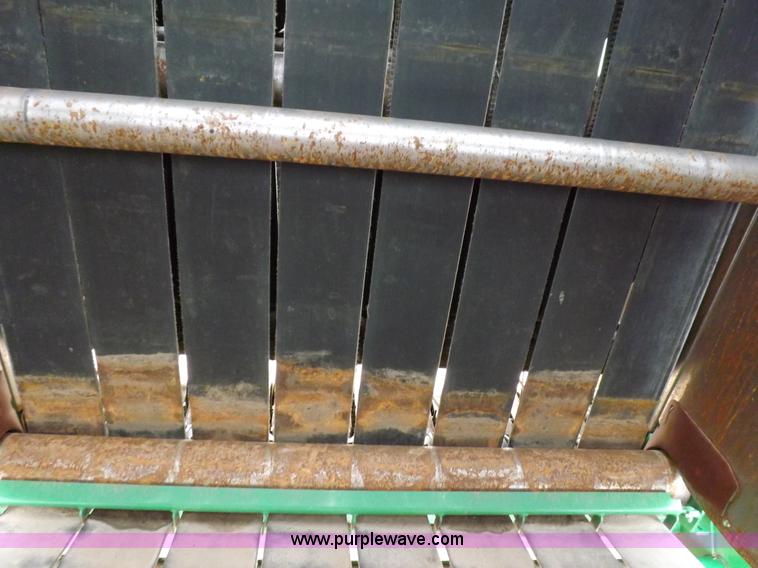 image for item J6869 2003 John Deere 567 Mega Wide round baler