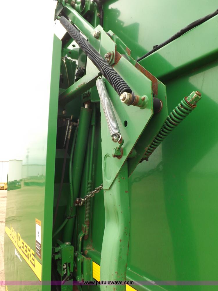 image for item J6869 2003 John Deere 567 Mega Wide round baler