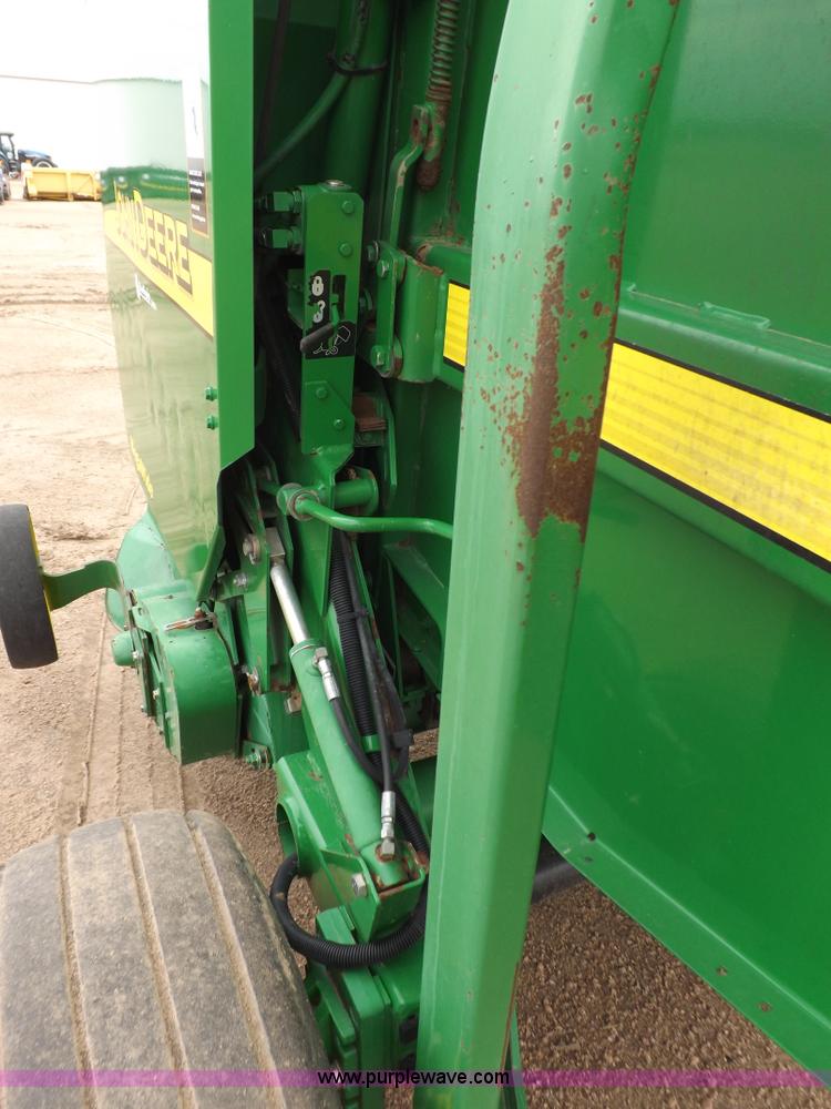 image for item J6869 2003 John Deere 567 Mega Wide round baler