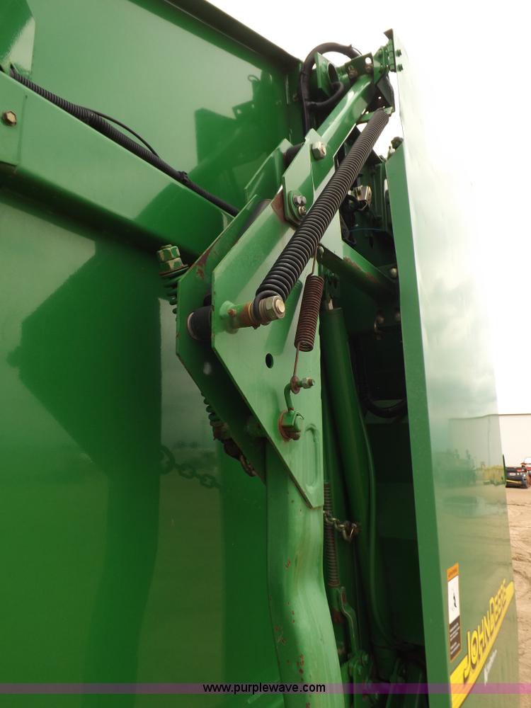 image for item J6869 2003 John Deere 567 Mega Wide round baler