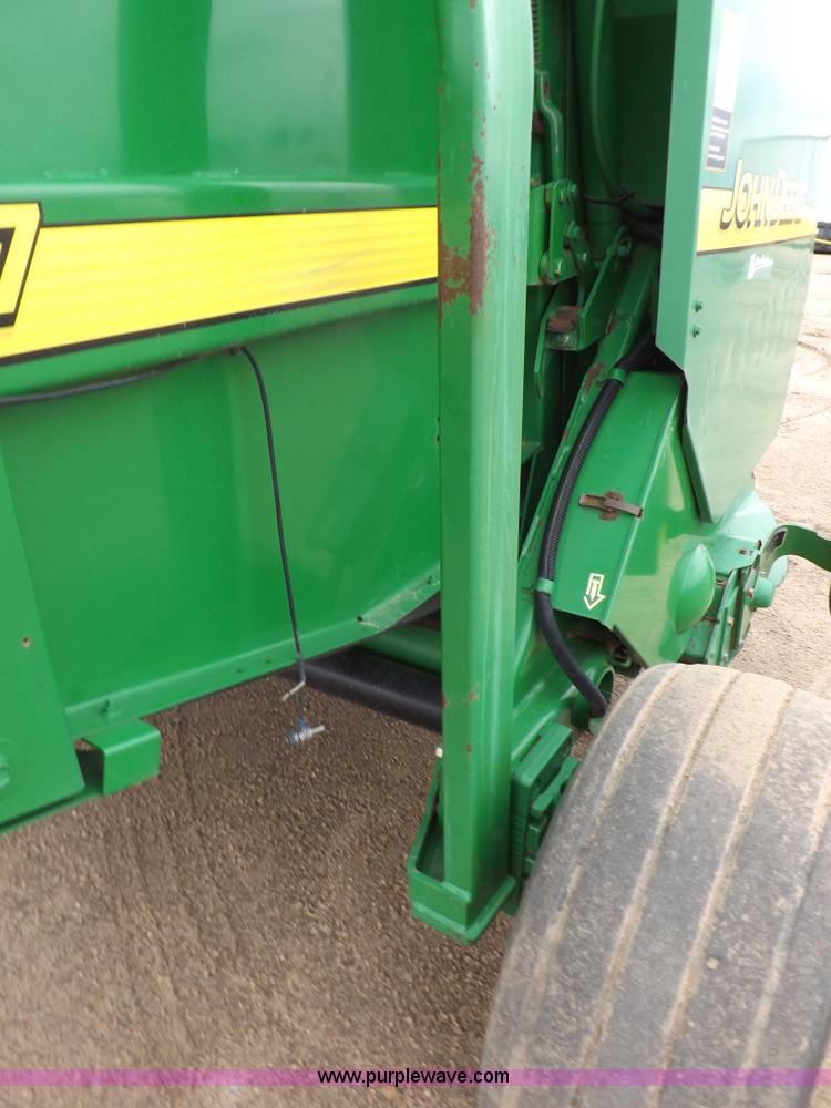 image for item J6869 2003 John Deere 567 Mega Wide round baler
