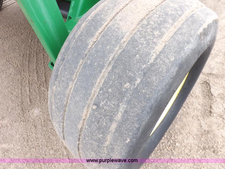 image for item J6869 2003 John Deere 567 Mega Wide round baler