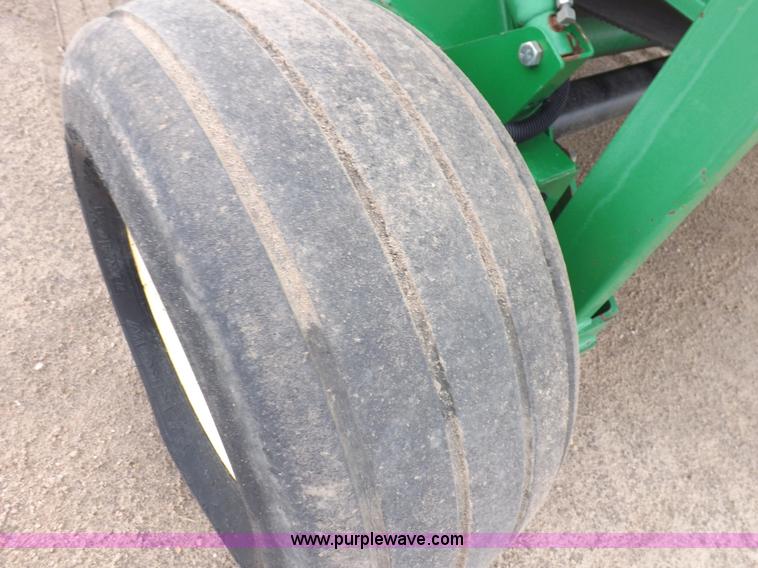 image for item J6869 2003 John Deere 567 Mega Wide round baler