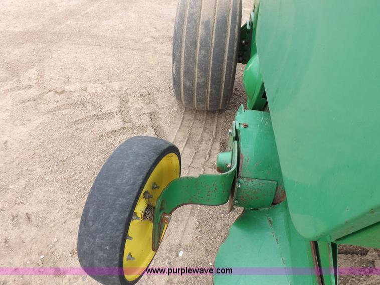image for item J6869 2003 John Deere 567 Mega Wide round baler