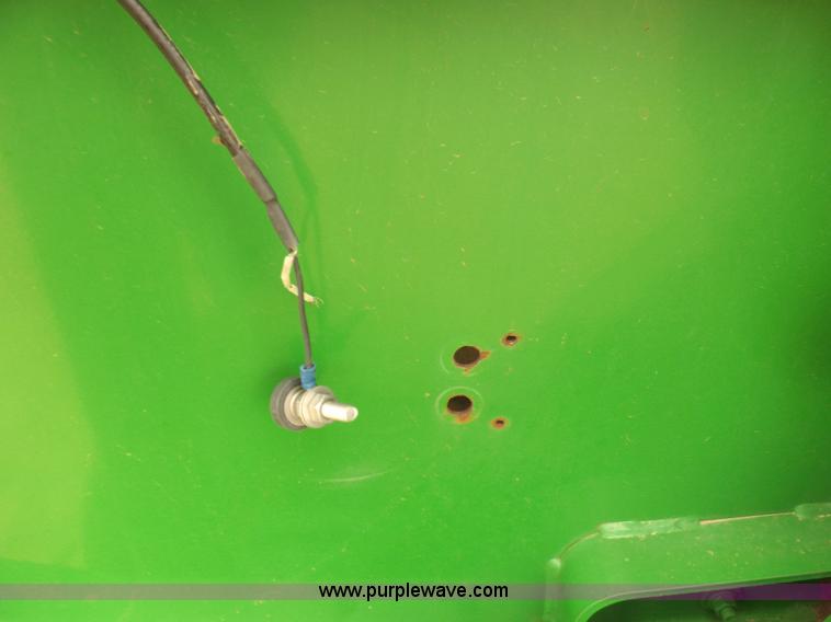 image for item J6869 2003 John Deere 567 Mega Wide round baler