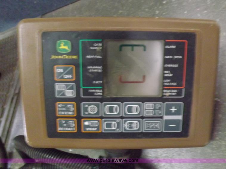 image for item J6869 2003 John Deere 567 Mega Wide round baler